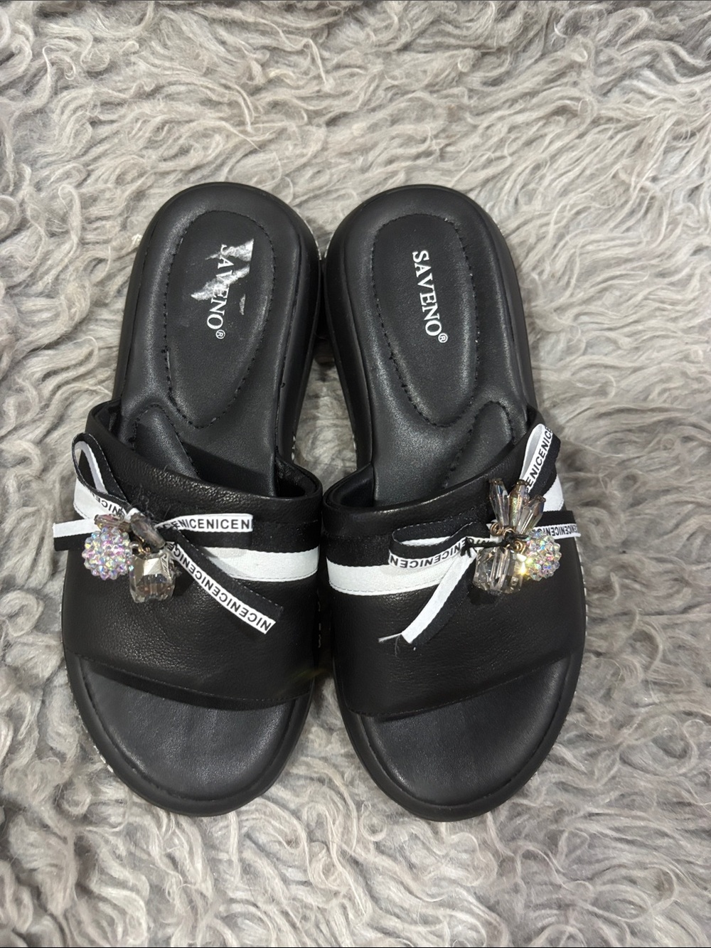 Saveno Black Slide Sandals with White Stripe and Crystal Bow Detail